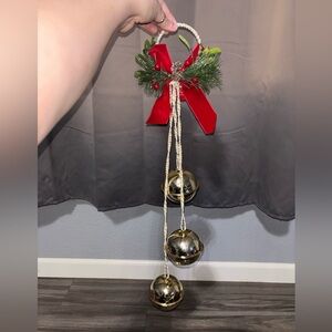 Ashland Gold Bell Hanger with Red Bow and Greenery